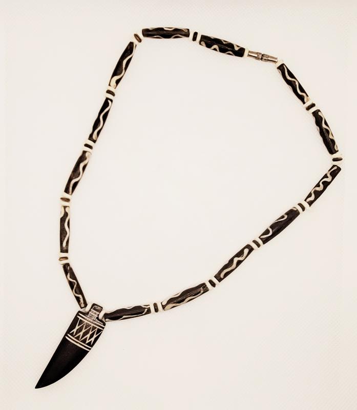 Mud Bone Necklace with Carved Pendant