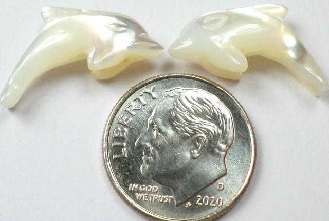 Hand Carved Mother of Pearl Dolphins